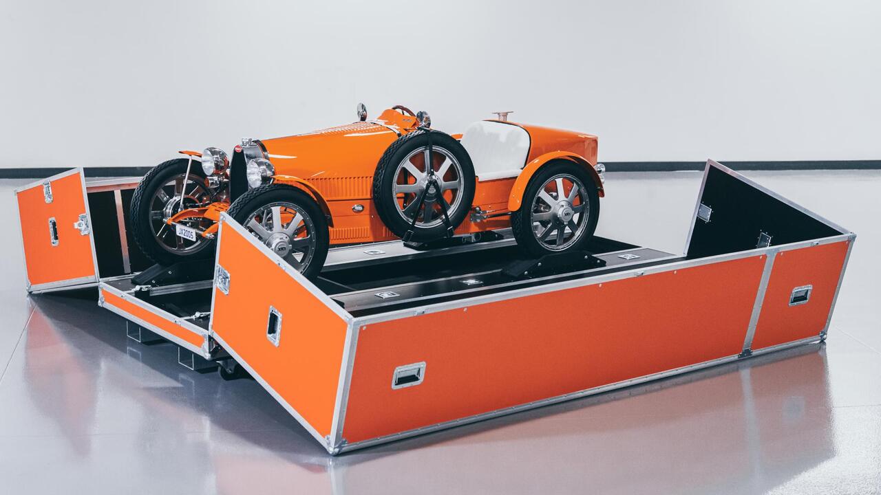 This Orange Bugatti Baby II will transfer VIP to airport terminals in Dubai